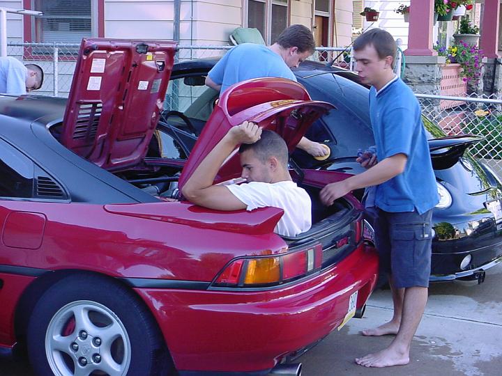 DSC00062.jpg - he REALLY loves his car...