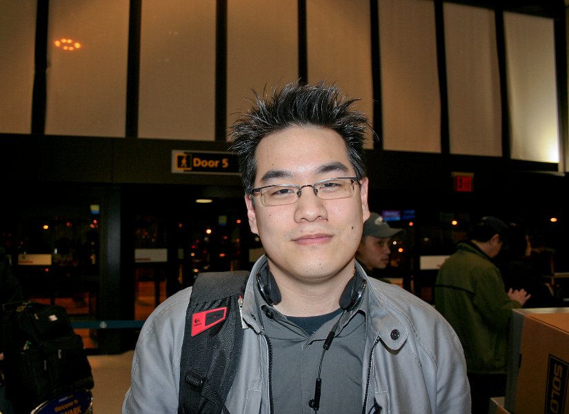 me at Newark Airport waiting to check in.