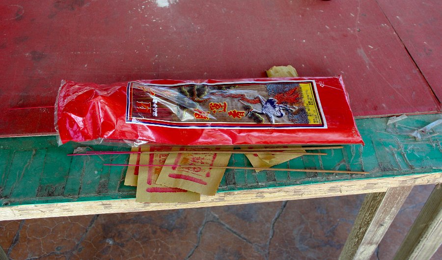 burning incense and money for the other side.